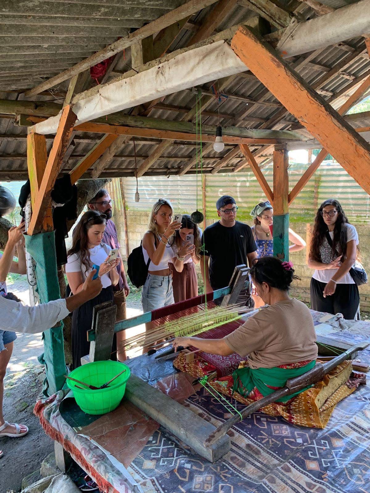 Foreign tourist visit to one of the art shops in Sukarara village